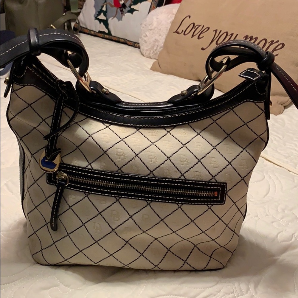 Cream and black Dooney and Bourke purse